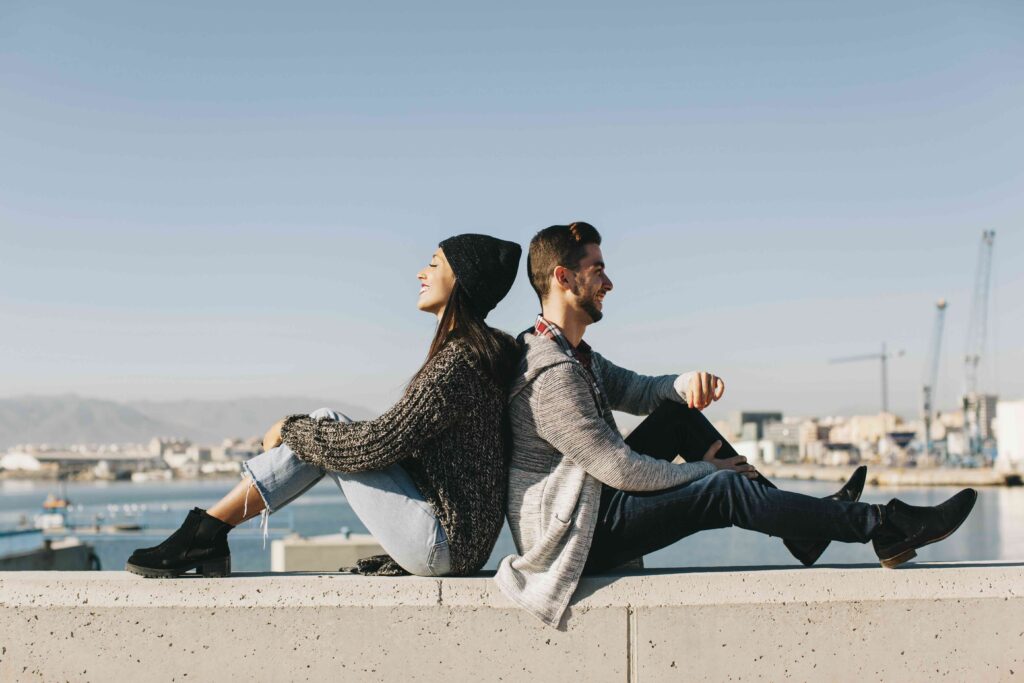 couple chilling harbor area