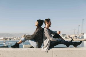 couple chilling harbor area