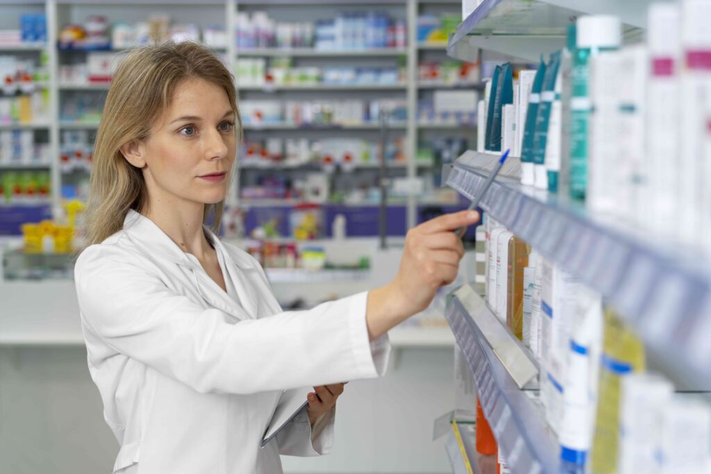 medium shot pharmacist working